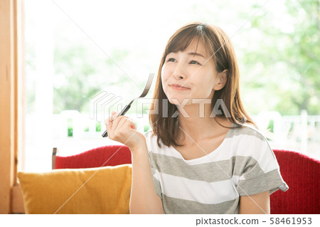 A woman with a delicious look A woman with a delicious look 58461953