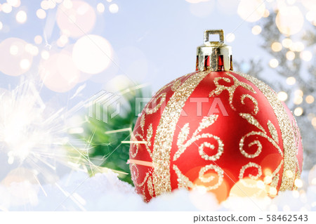 Christmas red ball on a light background. 58462543