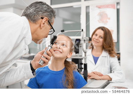 Nice girl checking vision in modern clinic 58464876