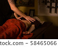 Body massage and spa treatment in modern salon 58465066