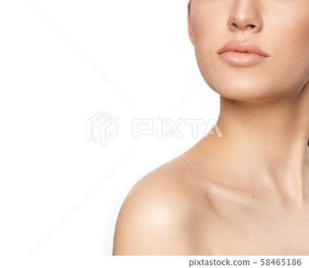 Closeup of plump lips of young woman on white background 58465186