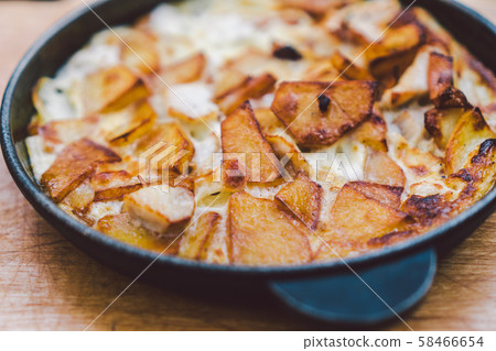 Potatoes baked with meat in the oven. Delicious dinner recipe. Potato pudding. Baked potato. Beef Potatoes baked with meat in the oven. Delicious dinner recipe. Potato pudding. Baked potato. Beef 58466654