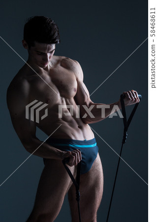 Muscular fitness young male antique perfect muscles six packs of abs and bare chest. Bodybuilder Muscular fitness young male antique perfect muscles six packs of abs and bare chest. Bodybuilder 58468611