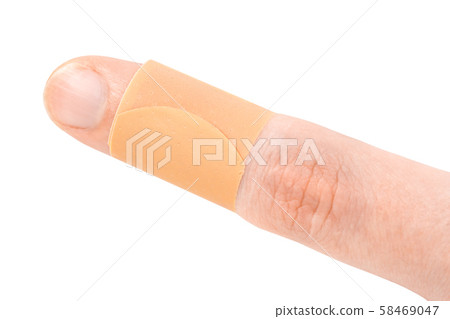 Adhesive bandage on finger 58469047