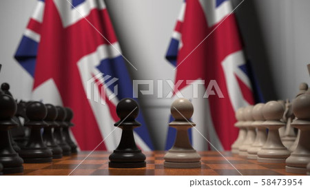 Chess game against flags of Great Britain. Political competition related 3D rendering 58473954
