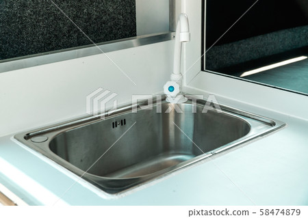 Picture of kitchen in a mobile house with sink Picture of kitchen in a mobile house with sink 58474879