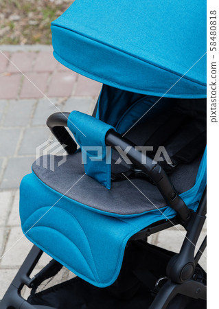 Original baby stroller, close-up details. New Original baby stroller, close-up details. New 58480818