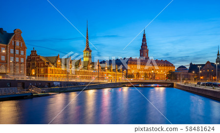 Copenhagen city at night with Christiansborg Palace in Copenhagen city, Denmark. Copenhagen city at night with Christiansborg Palace in Copenhagen city, Denmark. 58481624
