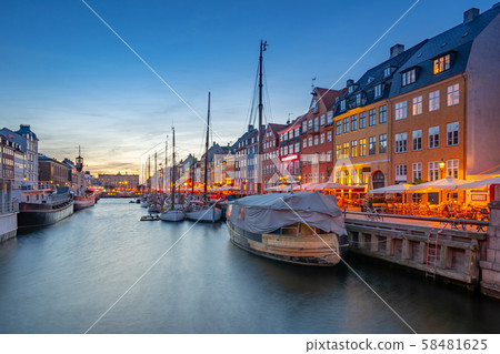 Nyhavn landmark buildings in Copenhagen city, Denmark. 58481625