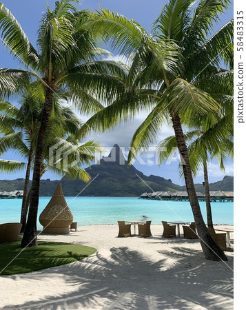 Bora Bora sea and mountains and white sand 58483315