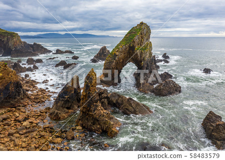 Aerial view of the Crohy Head Sea Arch, County Donegal - Ireland 58483579