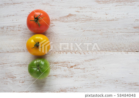 close-up of red, yellow and green tomatoes close-up of red, yellow and green tomatoes 58484048