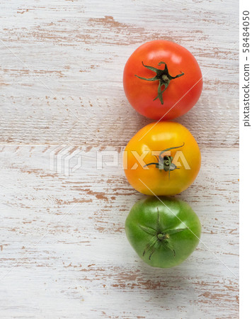 close-up of red, yellow and green tomatoes close-up of red, yellow and green tomatoes 58484050