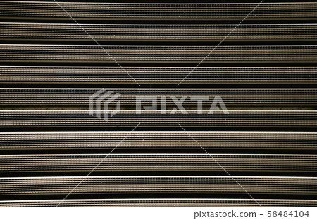 Metal grill with a rubber textured coating brown color.Background. Metal grill with a rubber textured coating brown color.Background. 58484104