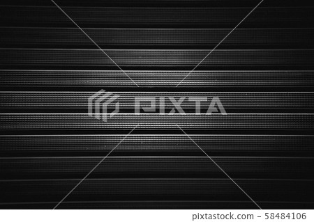 Metal grill with a rubber textured coating in black.Background. Metal grill with a rubber textured coating in black.Background. 58484106