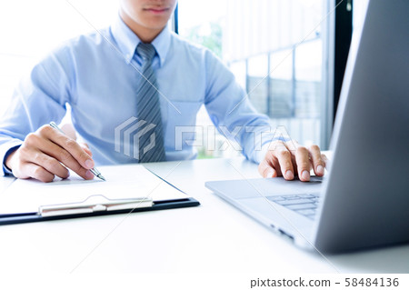 Businessman working with laptop for analyzing Businessman working with laptop for analyzing 58484136