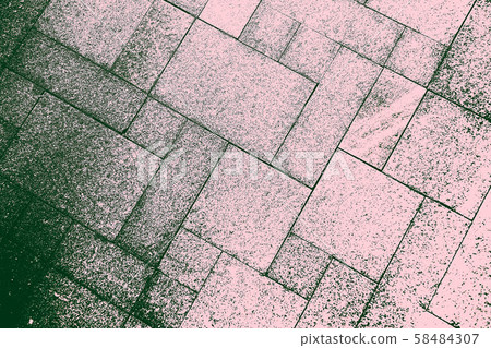 The sidewalk road made of natural stone is lined with mosaics of gray green color .Texture. The sidewalk road made of natural stone is lined with mosaics of gray green color .Texture. 58484307