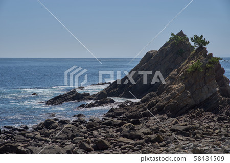 Coast and sheer rocks 58484509
