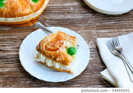 Spanish Christmas  cake with  fruits, nut and icing  58485041