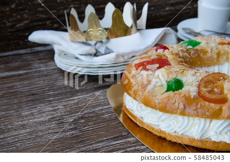 Spanish Christmas  cake with  fruits, nut and icing  58485043
