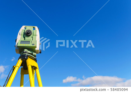 Total station outdoor against blue sky. Copy space. 58485094