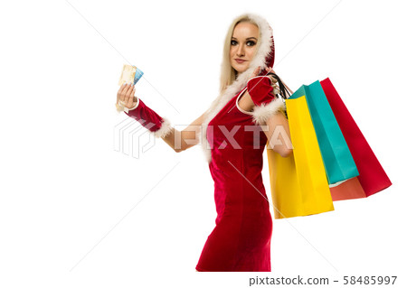 A beautiful sexy woman in a New Year's dress, hold 58485997