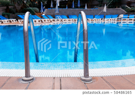 Swimming pool background for vacation concept. 58486165