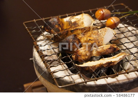 Grilled matsutake mushrooms Grilled matsutake mushrooms 58486177