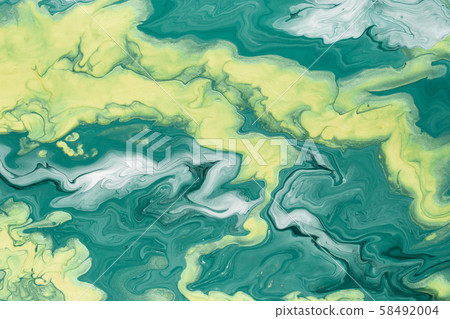 Free flowing yellow and green acrylic paint. Free flowing yellow and green acrylic paint. 58492004