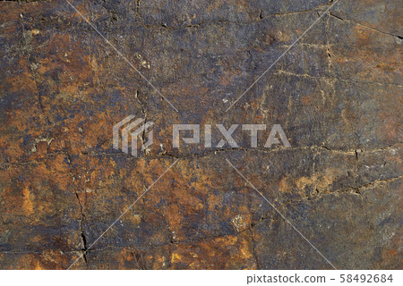Rocks carved by sea water erosion. Stones texture and background. Rock texture 58492684
