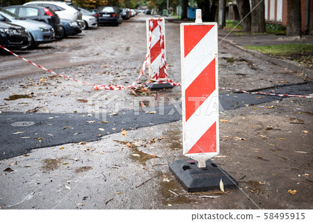 Barriers on the road. Limited traffic, road repair Barriers on the road. Limited traffic, road repair 58495915