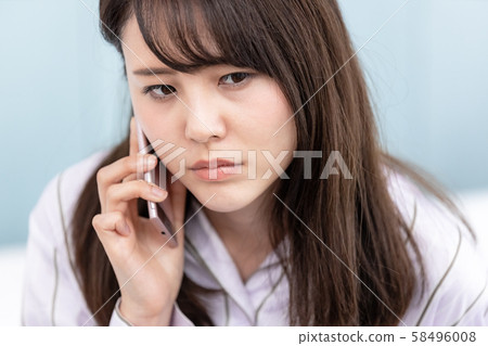 Young woman mobile phone Young woman mobile phone 58496008