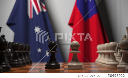 Chess game against flags of Australia and Taiwan. Political competition related 3D rendering Chess game against flags of Australia and Taiwan. Political competition related 3D rendering 58498022