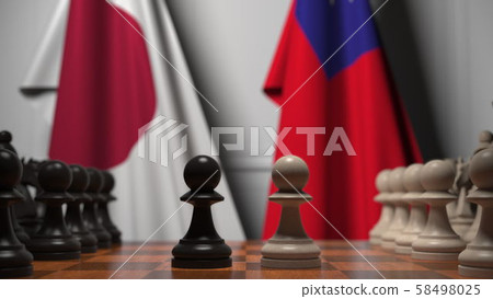 Chess game against flags of Japan and Taiwan. Political competition related 3D rendering 58498025