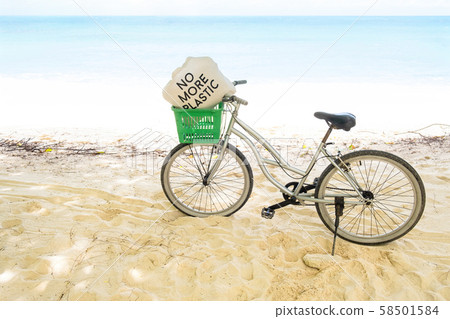 Lonely vintage bicycle on the tropical sandy beach 58501584