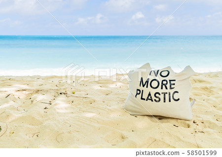 No More Plastic eco bag on sandy tropical beach No More Plastic eco bag on sandy tropical beach 58501599