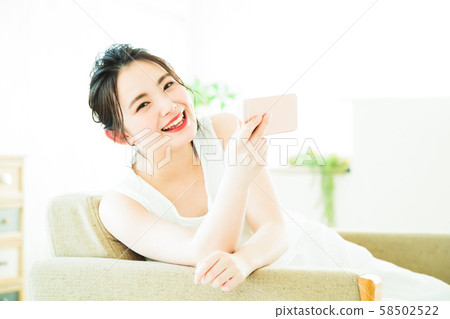 Woman Smartphone Young woman Living Cute lifestyle Woman Smartphone Young woman Living Cute lifestyle 58502522