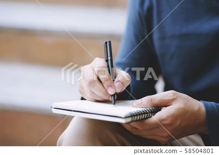 close up hand young man are sitting close up hand young man are sitting 58504801