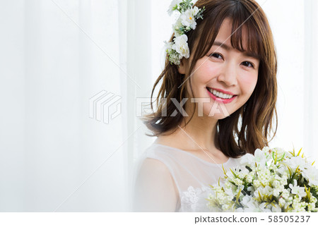 Young woman (bride, wedding dress, bridal image 58505237