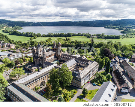 Aerial view on Laacher See behind the famous abbey Maria Laach in Rhineland-Palatinate, Germany 58508712