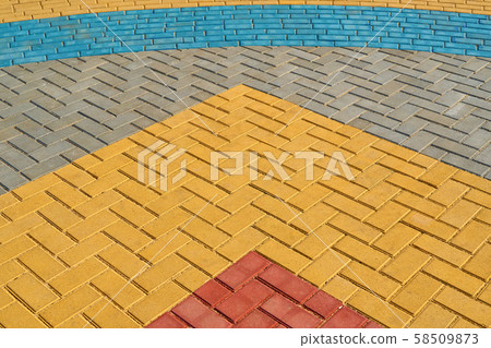 yellow, red and blue paving tiles for background 58509873