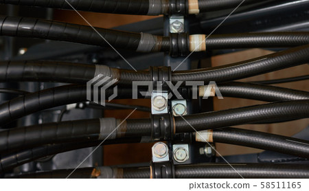 Close up view of hydraulic pipes of heavy industry 58511165