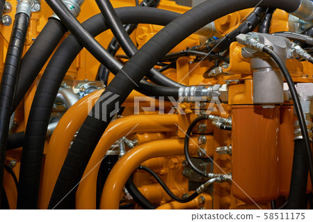 Close up view of hydraulic pipes of heavy industry Close up view of hydraulic pipes of heavy industry 58511175