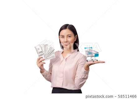 retail commercial business concept, Asian beautiful woman holding banknote money in hand and shopping cart in another hand isolated on white background with clipping path retail commercial business concept, Asian beautiful woman holding banknote money in hand and shopping cart in another hand isolated on white background with clipping path 58511466