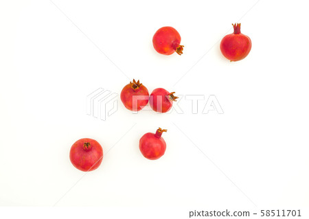 Pomegranate isolated on white background. Food background. Flat lay, top view Pomegranate isolated on white background. Food background. Flat lay, top view 58511701