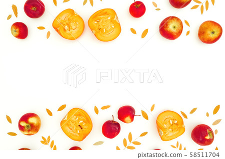 Fall leaves, apple and pumpkin on white background. Autumn, thanksgiving day concept. Flat lay Fall leaves, apple and pumpkin on white background. Autumn, thanksgiving day concept. Flat lay 58511704