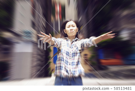 Asian woman falling from high building to the ground trying to raise her hand for help with sad emotion face Asian woman falling from high building to the ground trying to raise her hand for help with sad emotion face 58513481