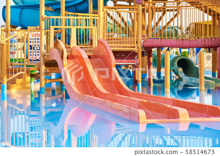Colorful slides in the waterpark close up. Colorful slides in the waterpark close up. 58514673