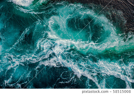 Waves of water of the river and the sea meet each Waves of water of the river and the sea meet each 58515008