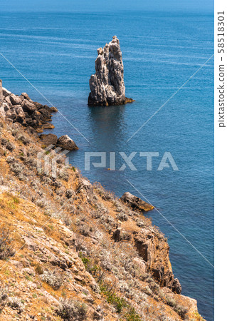 Seascape with a rock on the southern coast of Crimea Seascape with a rock on the southern coast of Crimea 58518301